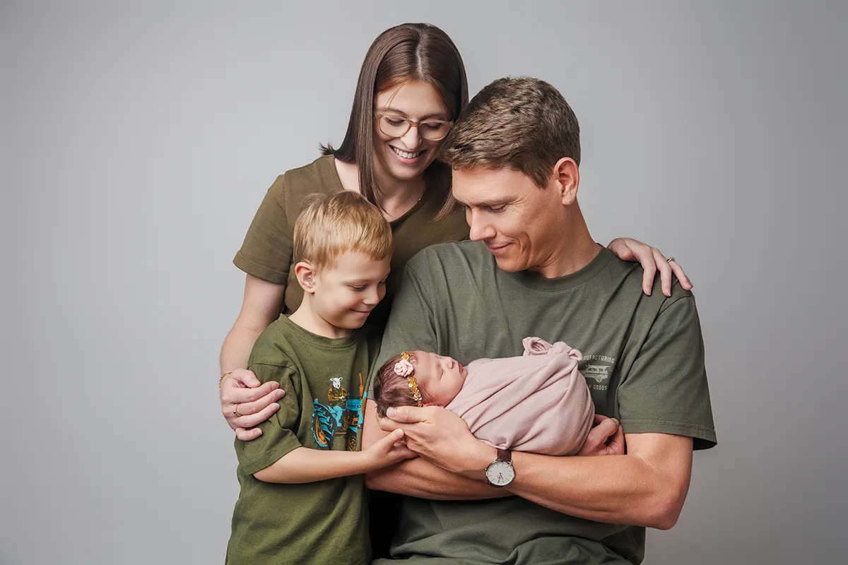 Parents and children during family photography session in Auckland studio