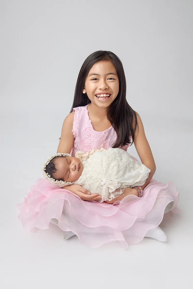 Studio family portrait photographed at Photo Hive Auckland
