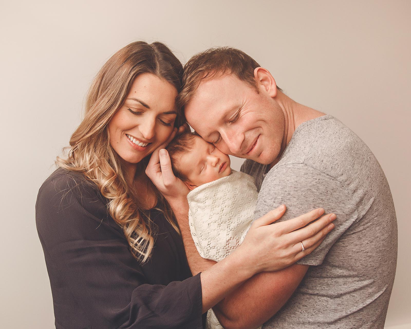 Newborn family studio portrait photographed by Photo Hive in Auckland